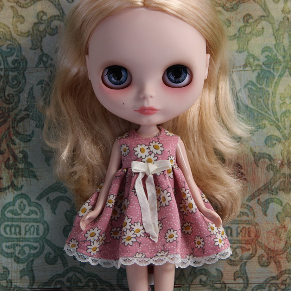 blythe doll wearing a romantic floral dress with white daisies